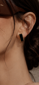 Black Onyx Stud Earrings featuring polished black onyx stone in a gold-tone rectangular setting.