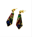 Mohave multi copper turquoise drop earrings in a black velvet jewelry box, highlighting the rich jewel-toned composite stone in gold bezel setting.