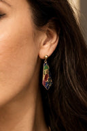 Mohave multi copper turquoise drop earrings in a black velvet jewelry box, highlighting the rich jewel-toned composite stone in gold bezel setting.