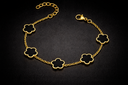 black and gold elegant clover bracelet