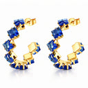 Onyx Cobalt Prism Hoop Earrings with blue cubic zirconia and PVD gold-plated stainless steel