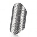 Polished stainless steel adjustable shield ring on white background