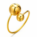 Onyx Orbit Adjustable Ring in PVD gold-plated stainless steel with polished sphere details